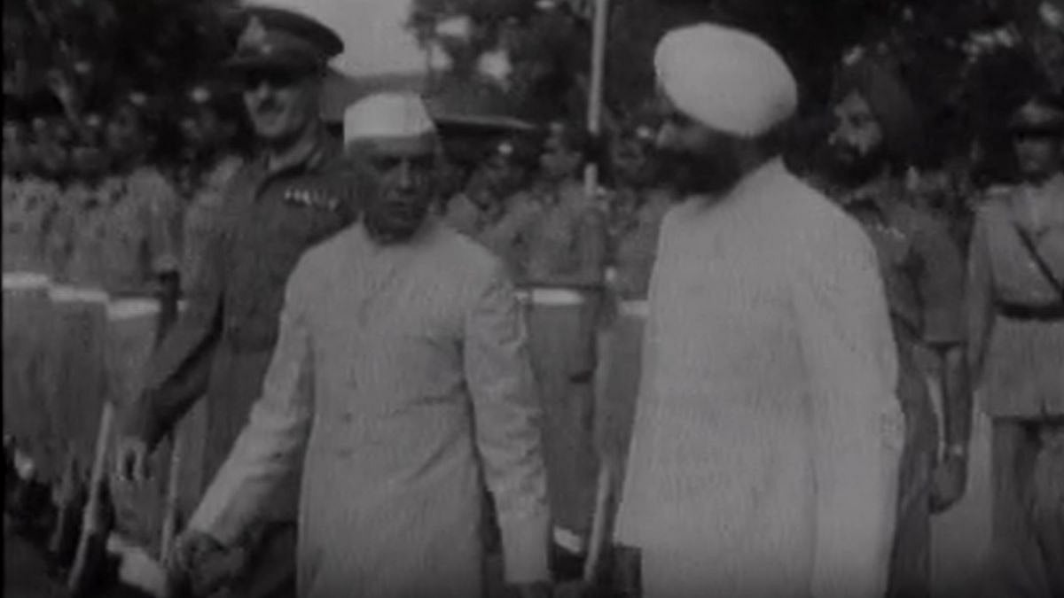 During the first anniversary in 1948, celebration of independence at Red Fort in Delhi, India, Pandit Nehru (Prime Minister) inspects the Guard of Honor.
